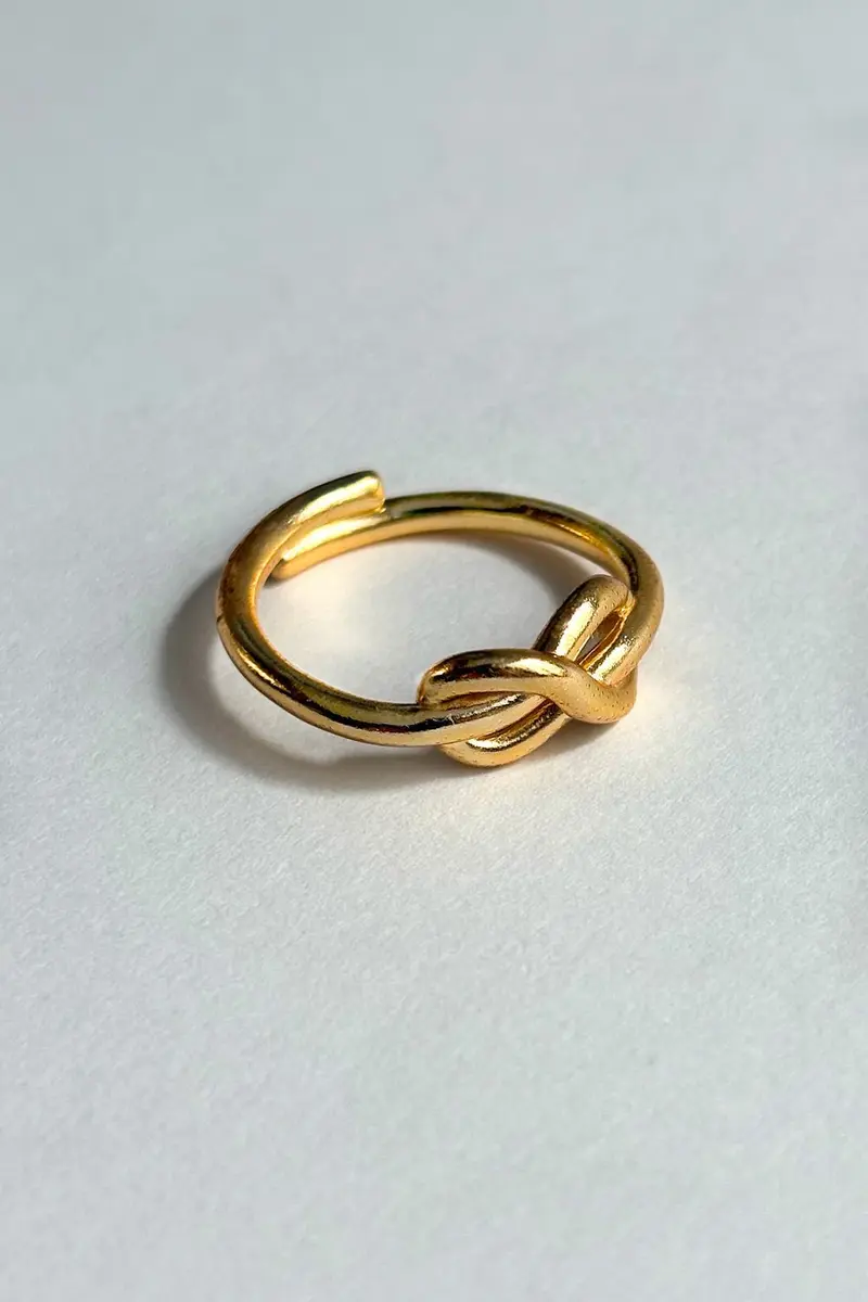 Anillo Dorado Ajustable Con Diseño Infinito