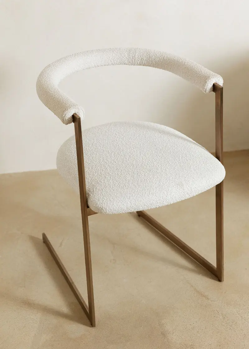 Silla de latón tapizada