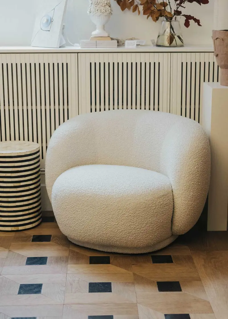 Sillón blanco bouclé redondo