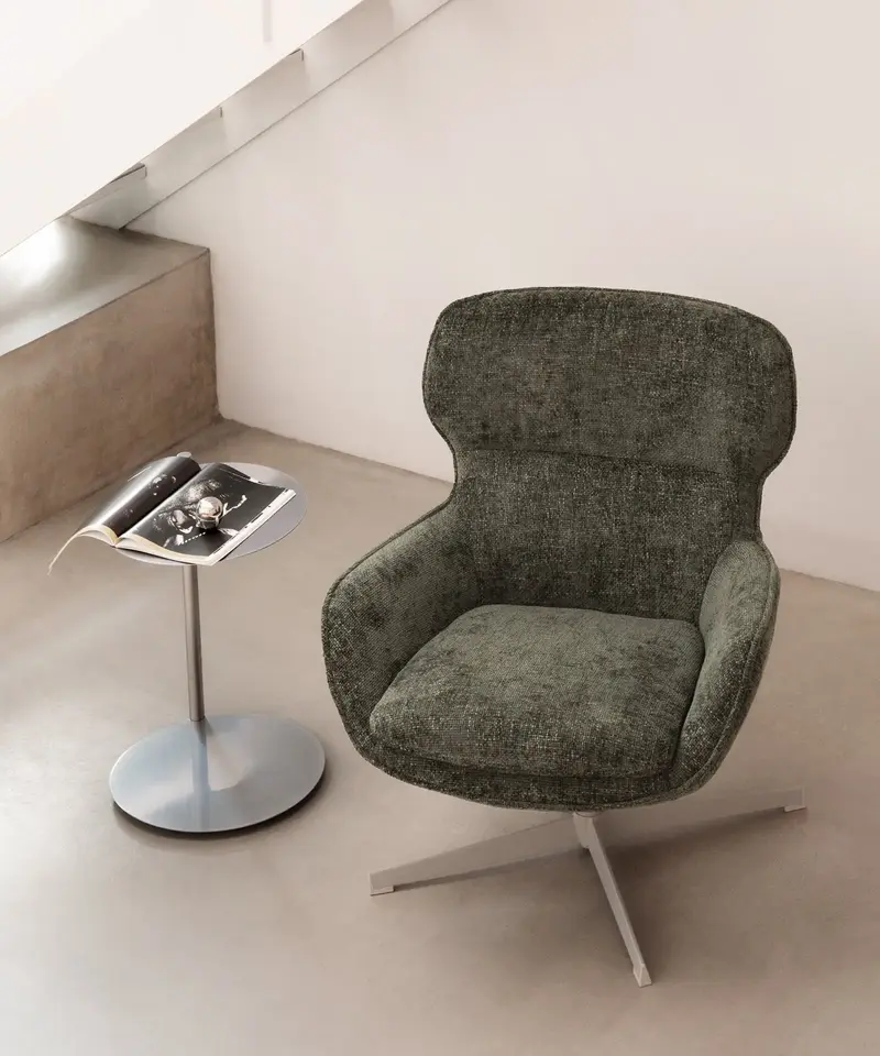 Sillón giratorio en tejido suave Norden